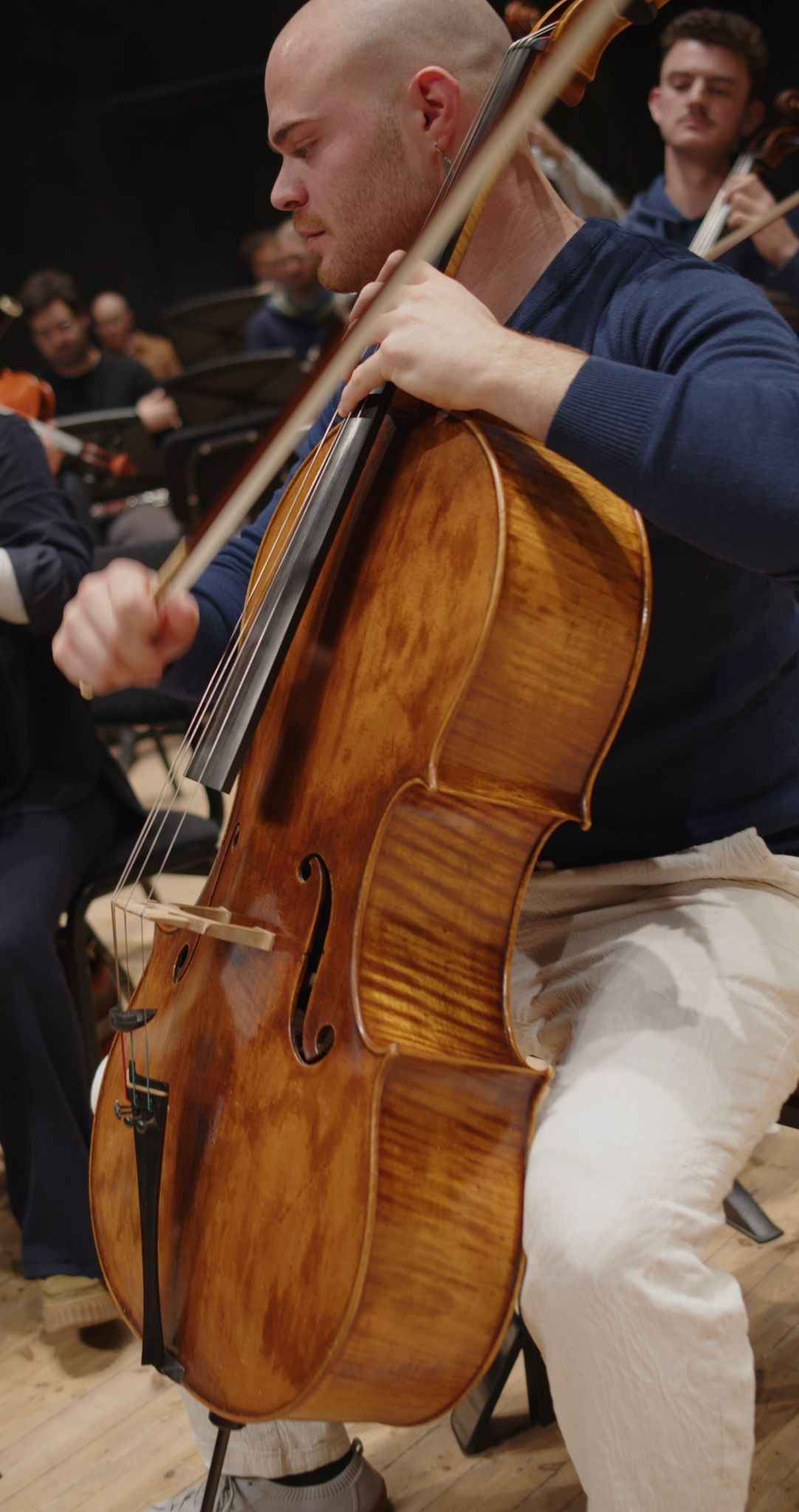 Cellist in rehearsal